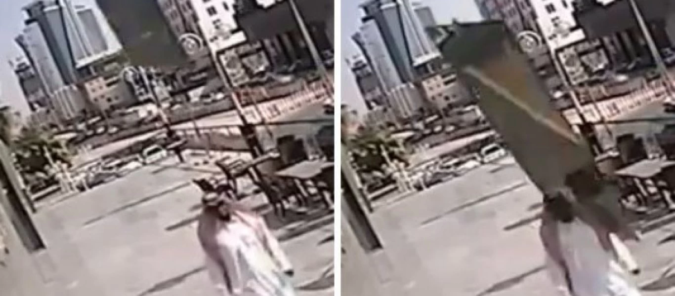 Γλίτωσε από θαύμα: Τζαμαρία έπεσε στο κεφάλι περαστικού και αυτό της γλίτωσε... χωρίς γρατζουνιά (βίντεο)